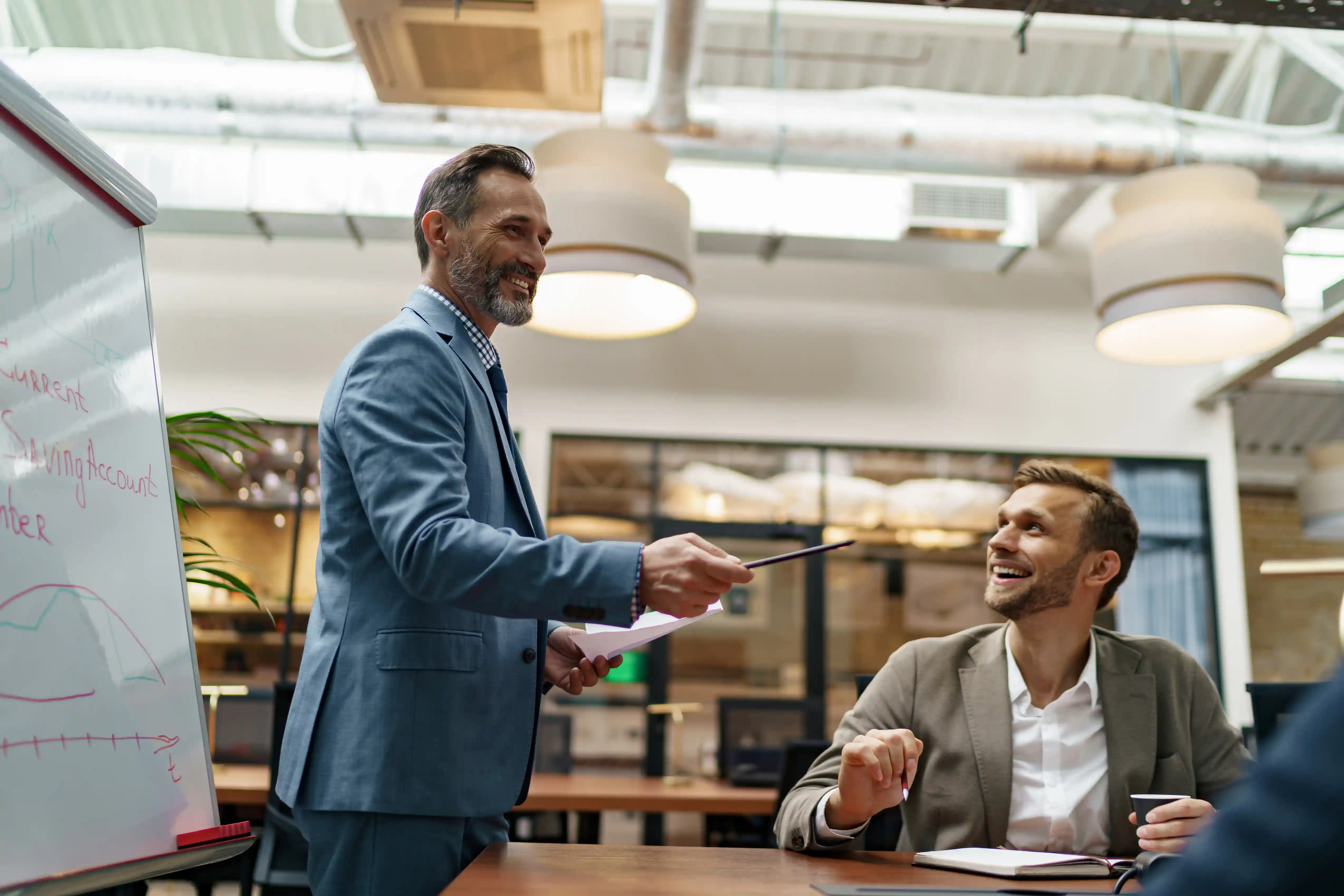 smiling-businessmen-meeting-in-modern-office-space-2026-09-24-07-18-13-utc